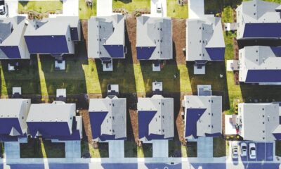 Aerial view of a neighborhood with similar houses