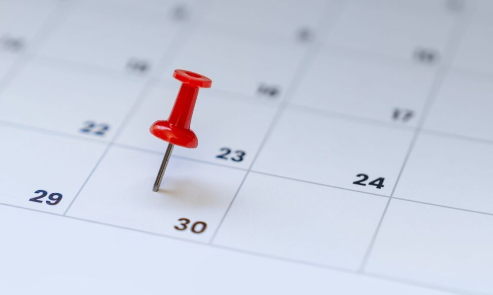 A red pin on the 30th day of a calendar month